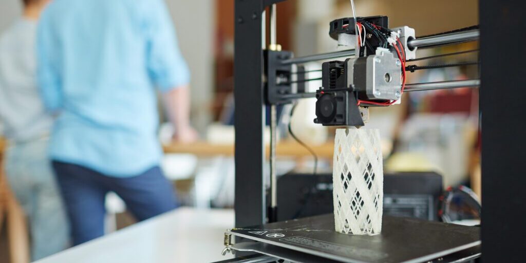 Modern 3d printer with architectural model